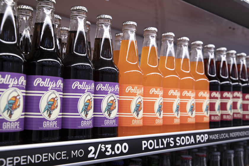 picture of purple and orange soda flavors on the shelf